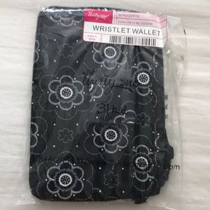 Wristlet wallet in Onyx Blossom.